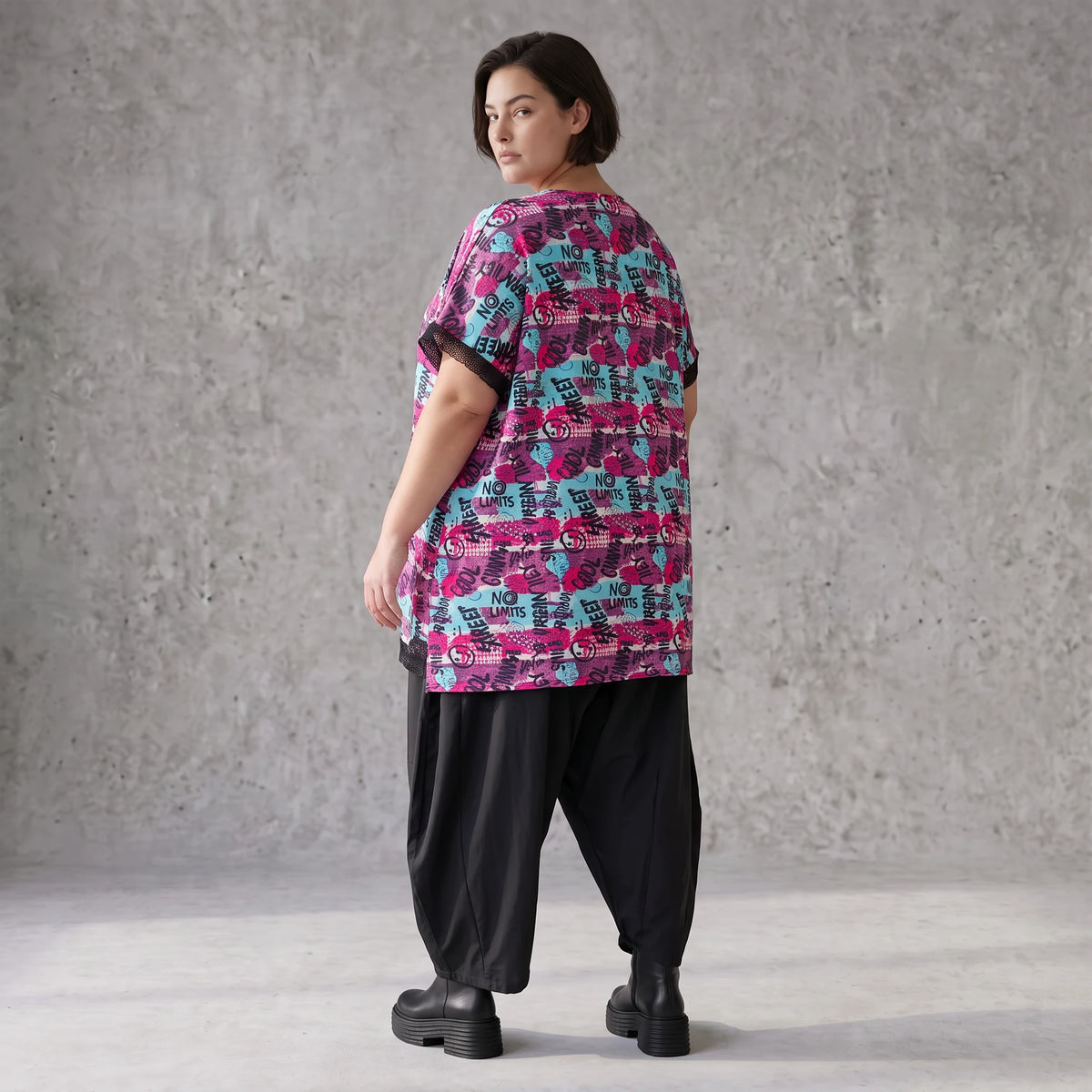 Asymmetrische Vokuhilaweste aus Jersey und Netzstoff im Materialmix vorne kurz hinten lang