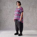 Asymmetrische Vokuhilaweste aus Jersey und Netzstoff im Materialmix vorne kurz hinten lang