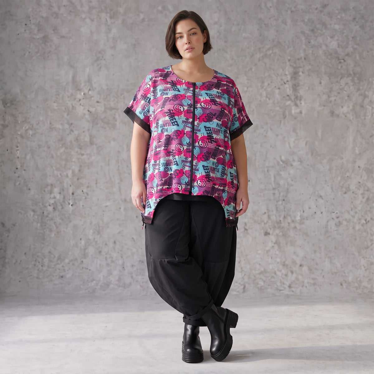 Asymmetrische Vokuhilaweste aus Jersey und Netzstoff im Materialmix vorne kurz hinten lang