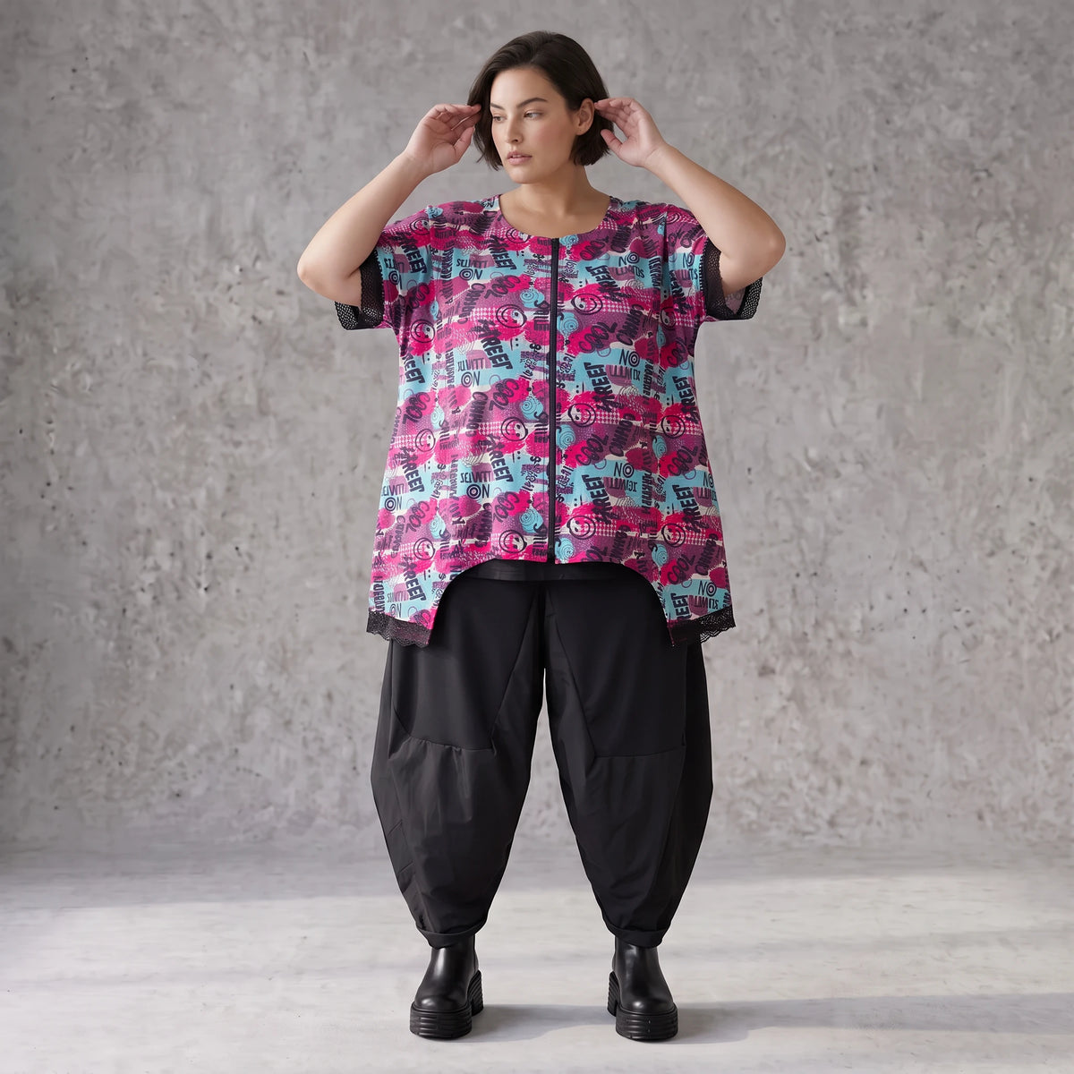 Asymmetrische Vokuhilaweste aus Jersey und Netzstoff im Materialmix vorne kurz hinten lang
