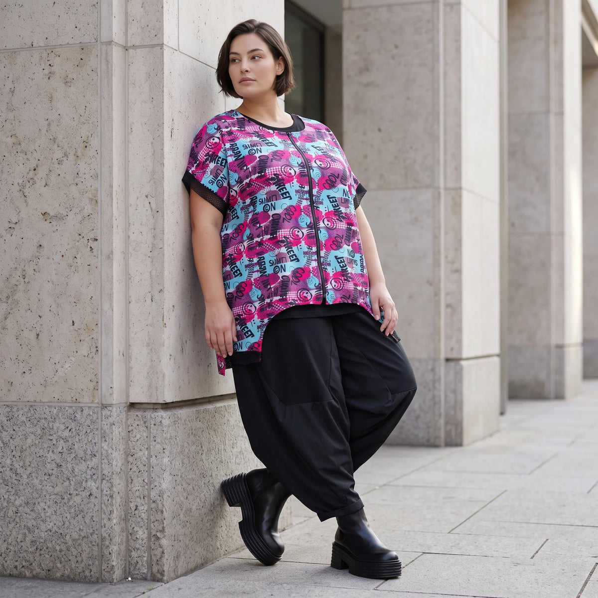 Asymmetrische Vokuhilaweste aus Jersey und Netzstoff im Materialmix vorne kurz hinten lang