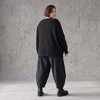 Strickshirt in Schwarz/Rot mit Destroyedoptik Fransen und V-Ausschnitt gerader Schnitt