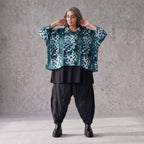 Kastiges Rollkragenshirt aus Viskosetwill mit Stretch und 3/4-Arm mit lockerem Fall