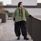 Teddyweste mit Kapuze und Tuelldetails in gerundeter Form weich warm fuer Wintertage