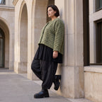 Kuschelige khakifarbene Teddyjacke mit Rundhalsausschnitt Knopfleiste und softer Form