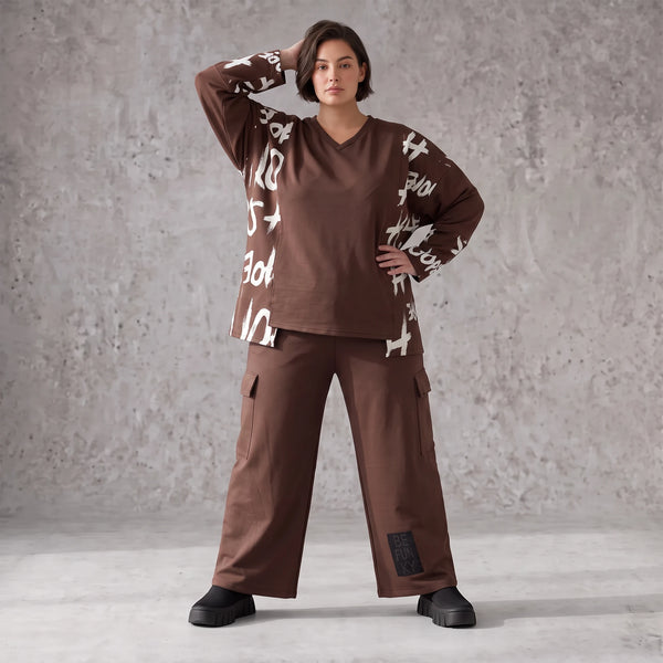 Braune Ballonhose aus weichem Fleece mit elastischem Bund und Taschen mit Klappe vorn
