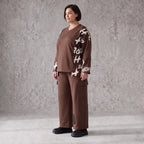 Braune Ballonhose aus weichem Fleece mit elastischem Bund und Taschen mit Klappe vorn