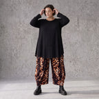 Ballonhose aus Stretch Twill in Rost/Weiß mit weitem Bein und elastischem Bund mit Taschen