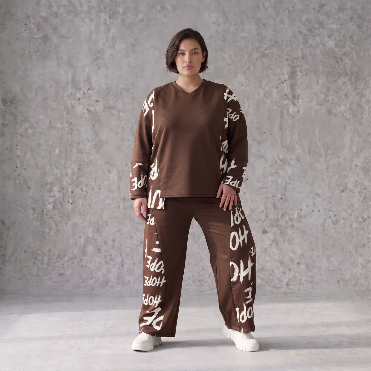 Braune Fleece Ballonhose mit Stretch Schnürbund und Taschen für winterlichen Komfort