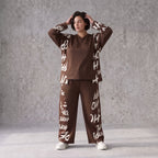 Braune Fleece Ballonhose mit Stretch Schnürbund und Taschen für winterlichen Komfort