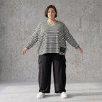 Langarmshirt aus Jersey mit Stretch in Schwarz/Weiss locker geschnitten mit V-Ausschnitt