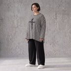 A-Linie Langarmshirt aus feinem Stretchjersey in Schwarz/Weiß mit seitlichen Schlitzen