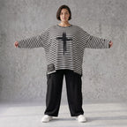 A-Linie Langarmshirt aus feinem Stretchjersey in Schwarz/Weiß mit seitlichen Schlitzen
