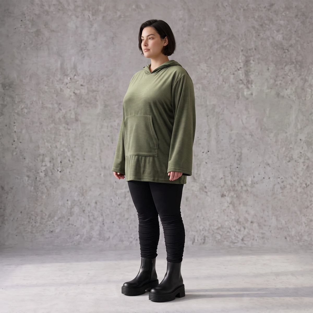 Grüner Ripphoodie aus Stretchmaterial mit Kapuze Kängurutasche und geradem Schnitt