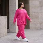 Pinkes Langarmshirt in Glockenform aus softer Slinkyqualität mit Rundhalsausschnitt