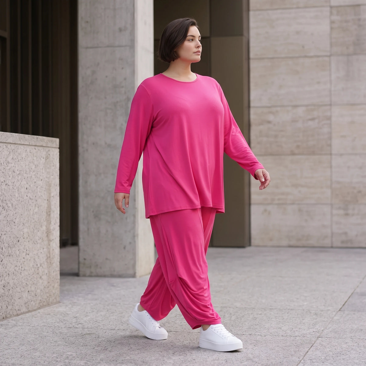 Pinkes Langarmshirt in Glockenform aus softer Slinkyqualität mit Rundhalsausschnitt