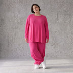 Pinkes Langarmshirt in Glockenform aus softer Slinkyqualität mit Rundhalsausschnitt
