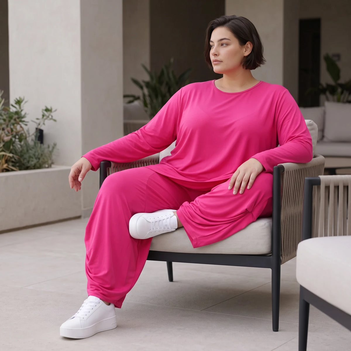 Pinkes Langarmshirt in Glockenform aus softer Slinkyqualität mit Rundhalsausschnitt