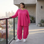 Pinkes Langarmshirt in Glockenform aus softer Slinkyqualität mit Rundhalsausschnitt