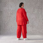 Rotes Langarmshirt aus Slinkystoff mit Stretch in glockiger Form und Rundhalsausschnitt