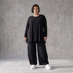 Schwarzes Langarmshirt aus Slinky in Glockenform mit Rundhalsausschnitt elastisch Basic