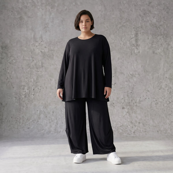 Schwarzes Langarmshirt aus Slinky in Glockenform mit Rundhalsausschnitt elastisch Basic