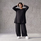 Schwarzes Langarmshirt aus Slinky in Glockenform mit Rundhalsausschnitt elastisch Basic