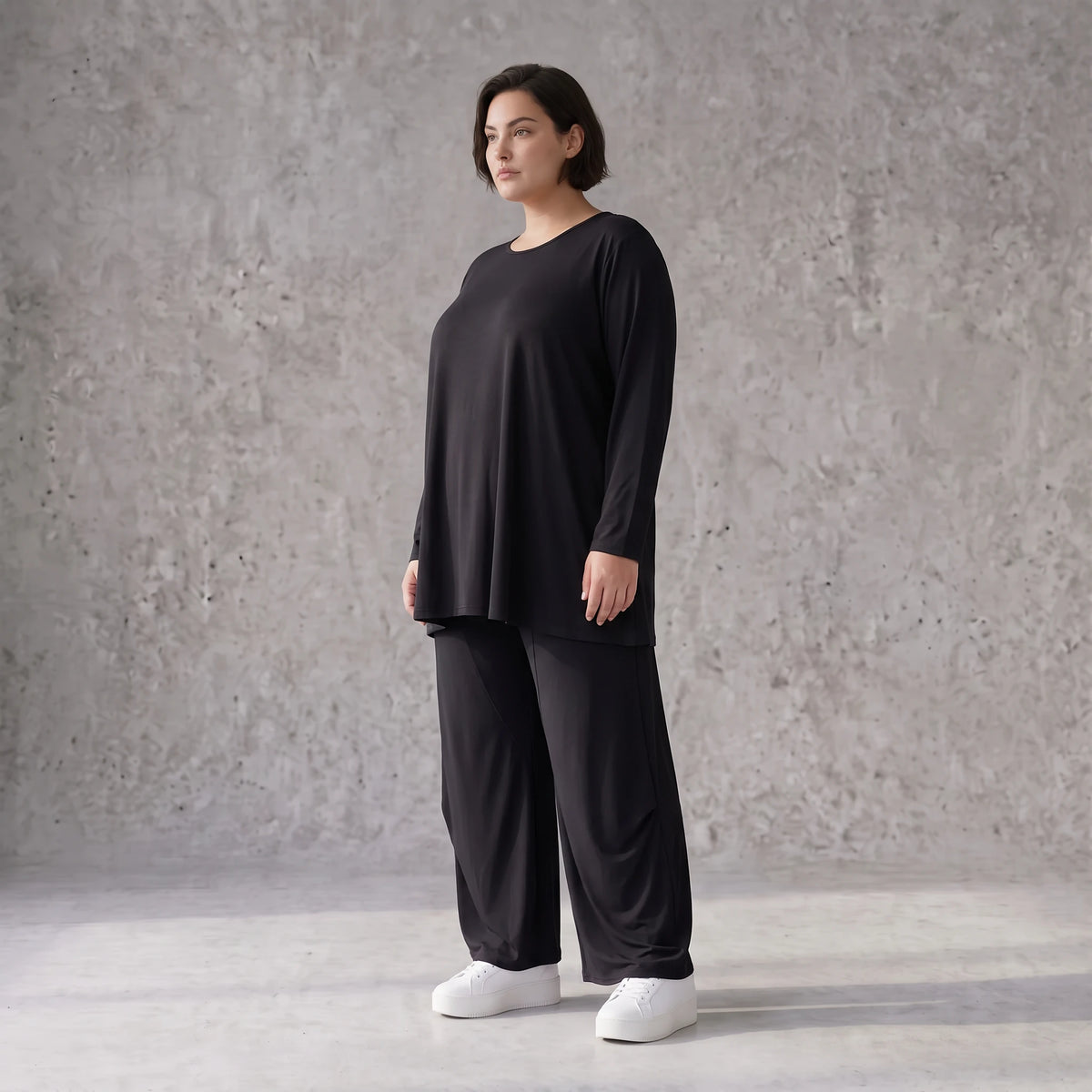 Schwarzes Langarmshirt aus Slinky in Glockenform mit Rundhalsausschnitt elastisch Basic
