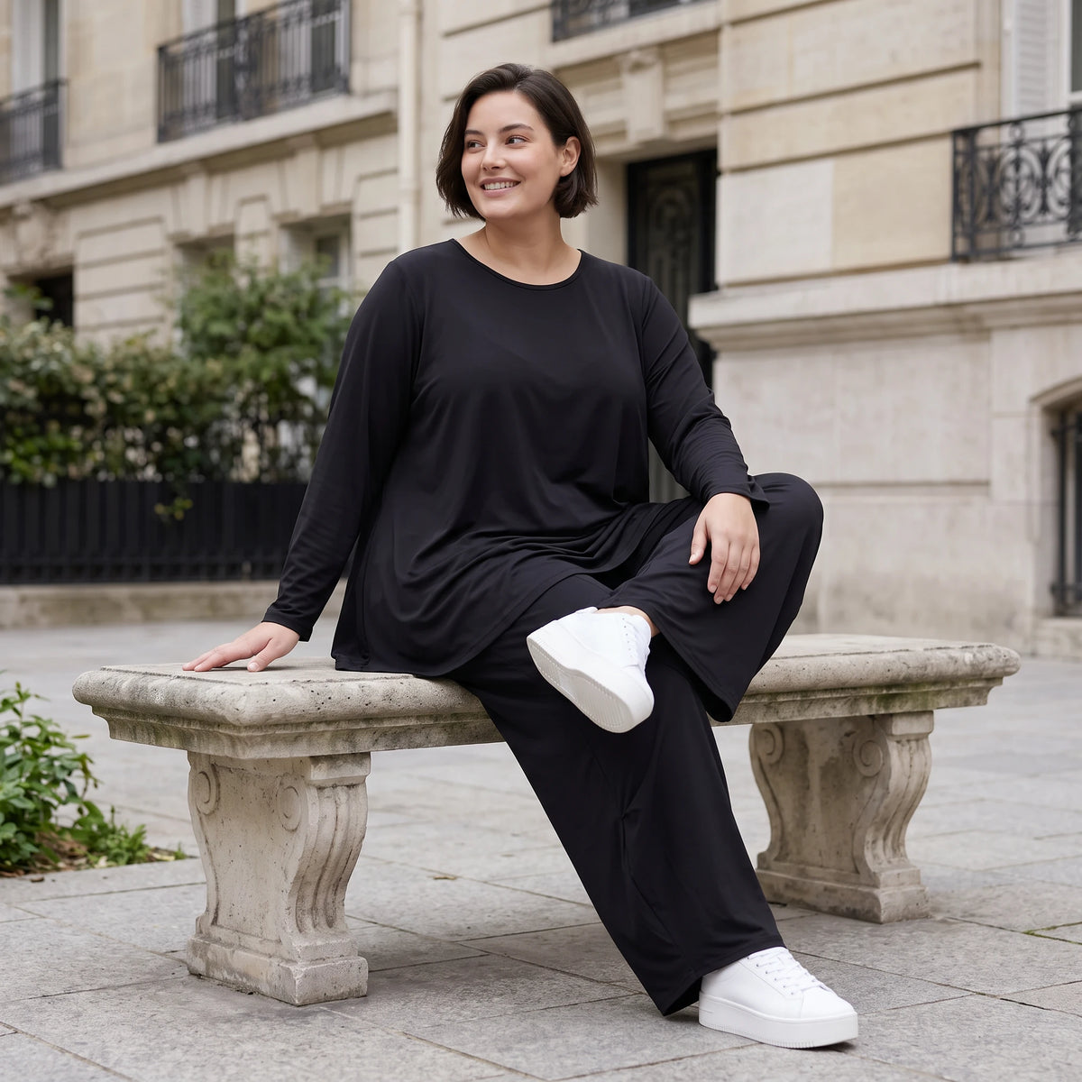 Schwarzes Langarmshirt aus Slinky in Glockenform mit Rundhalsausschnitt elastisch Basic