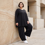 Schwarzes Langarmshirt aus Slinky in Glockenform mit Rundhalsausschnitt elastisch Basic