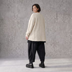 Cremefarbene Strickjacke in A-Form mit Reißverschluss Taschen und weichem Stretchstrick
