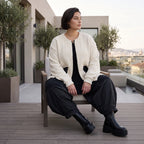 Cremefarbene Strickjacke in A-Form mit Reißverschluss Taschen und weichem Stretchstrick