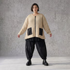 Beige Strickjacke Glockenform mit Reißverschluss Taschen Stretch und Rundhalsausschnitt