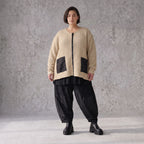 Beige Strickjacke Glockenform mit Reißverschluss Taschen Stretch und Rundhalsausschnitt