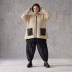Beige Strickjacke Glockenform mit Reißverschluss Taschen Stretch und Rundhalsausschnitt
