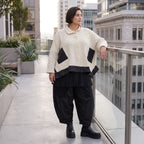Cremefarbene Strickjacke in A-Linie mit Hemdkragen Knopfleiste Taschen Zipfelsaum