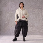 Cremefarbene Strickjacke in A-Linie mit Hemdkragen Knopfleiste Taschen Zipfelsaum