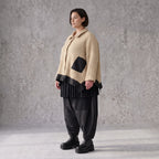 Beige Strickjacke in A-Linie mit Hemdkragen Zipfelsaum und warmem weichem Stretchgriff