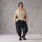Beige Strickjacke in A-Linie mit Hemdkragen Zipfelsaum und warmem weichem Stretchgriff