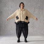 Beige Strickjacke in A-Linie mit Hemdkragen Zipfelsaum und warmem weichem Stretchgriff