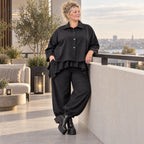 Schwarze Denimballonhose mit Stretch und bequemem Schlupfbund in weiter Passform
