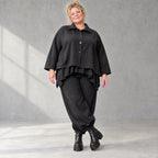 Schwarze Denimballonhose mit Stretch und bequemem Schlupfbund in weiter Passform