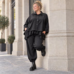 Schwarze Denimballonhose mit Stretch und bequemem Schlupfbund in weiter Passform
