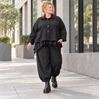 Schwarze Denimballonhose mit Stretch und bequemem Schlupfbund in weiter Passform