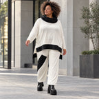 Rollkragenshirt aus fließendem Jersey mit Stretch Vokuhilaform mit seitlichen Schlitzen