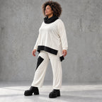 Rollkragenshirt aus fließendem Jersey mit Stretch Vokuhilaform mit seitlichen Schlitzen