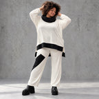 Rollkragenshirt aus fließendem Jersey mit Stretch Vokuhilaform mit seitlichen Schlitzen