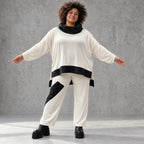 Rollkragenshirt aus fließendem Jersey mit Stretch Vokuhilaform mit seitlichen Schlitzen