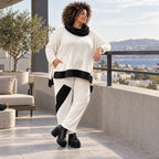 Rollkragenshirt aus fließendem Jersey mit Stretch Vokuhilaform mit seitlichen Schlitzen