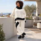 Rollkragenshirt aus fließendem Jersey mit Stretch Vokuhilaform mit seitlichen Schlitzen